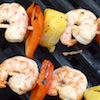 Photo - shrimp cooking on a grill 