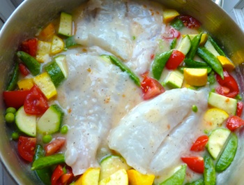 Picture of cod baked with lemon garlic sauce and vegetables