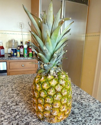 Picture of ripe pineapple ready to be cut into pieces / www.super-seafood-recipes.com