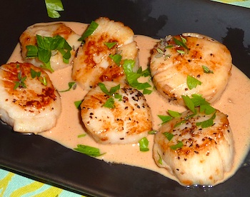 Photo of pan-seared sea scallops with creamy garlic sauce